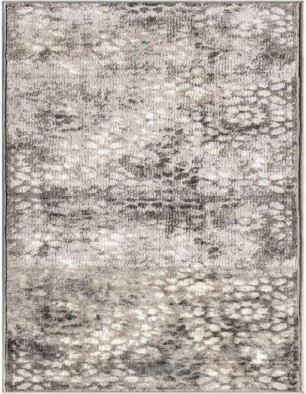 A 7 ft runner rug in shades of gray and silver with a distressed bohemian floral pattern, ideal for a hallway.