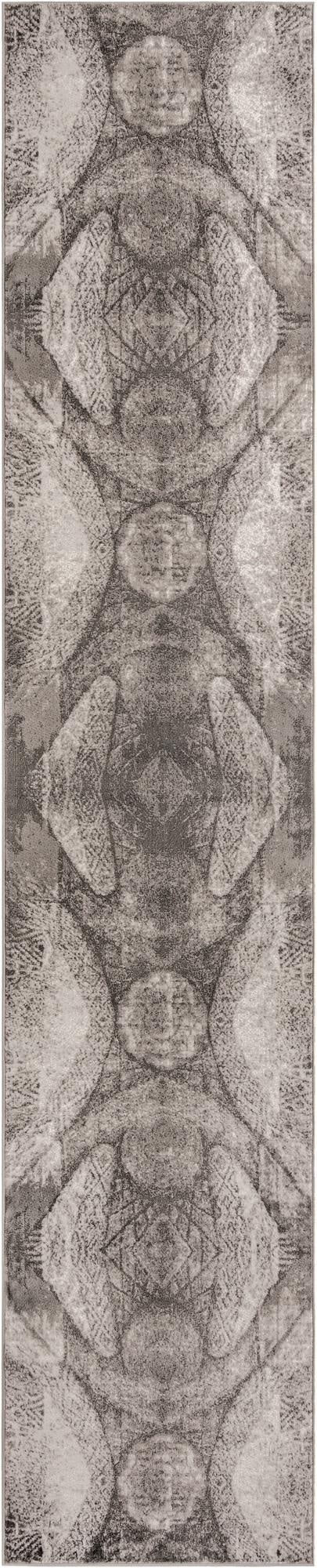 A 16 ft runner rug from the Monte Carlo collection, featuring a distressed gray and silver medallion pattern, ideal for hallways.