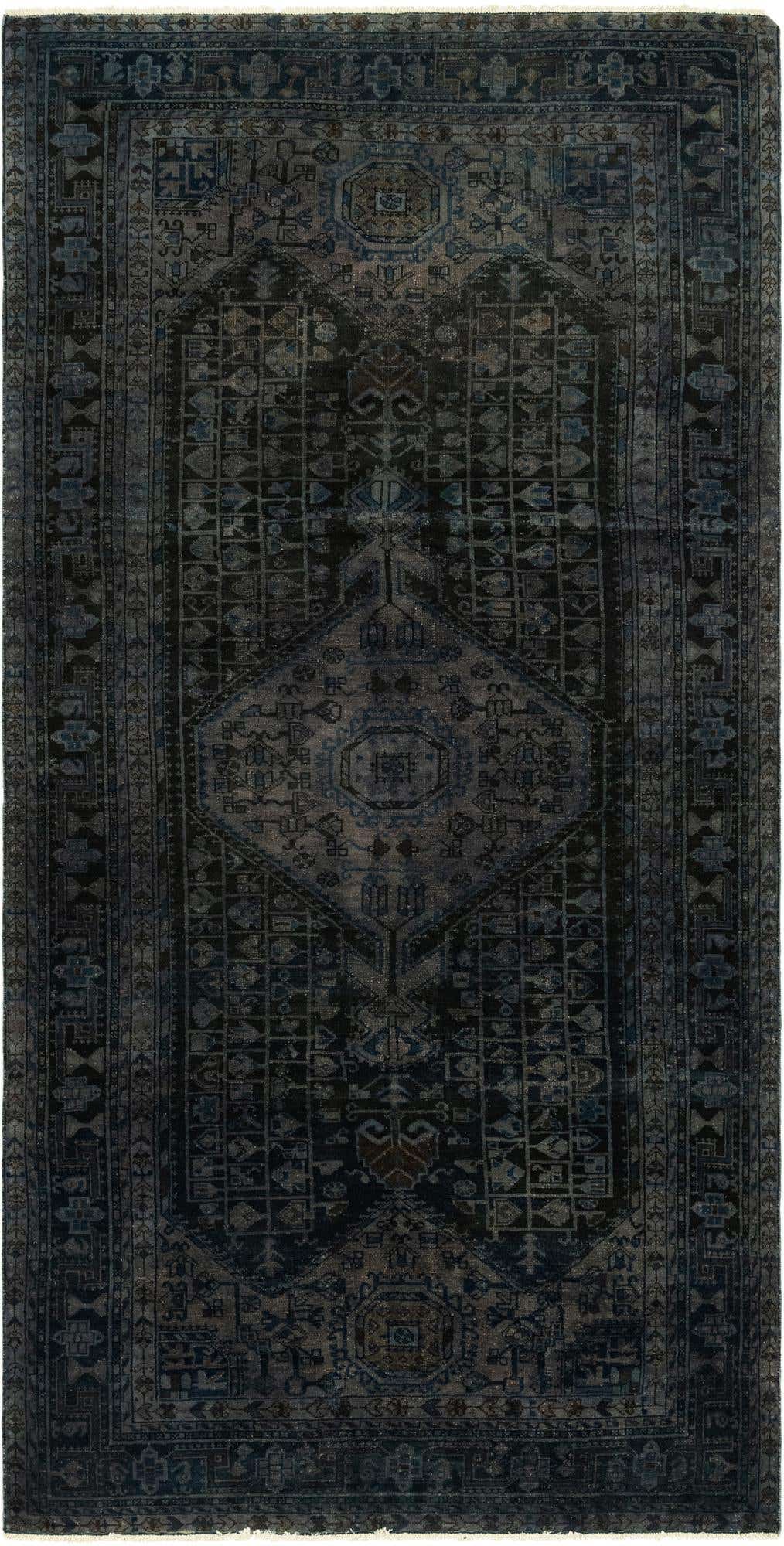 A handmade 11 ft runner rug featuring a distressed Persian pattern in shades of gray and silver.