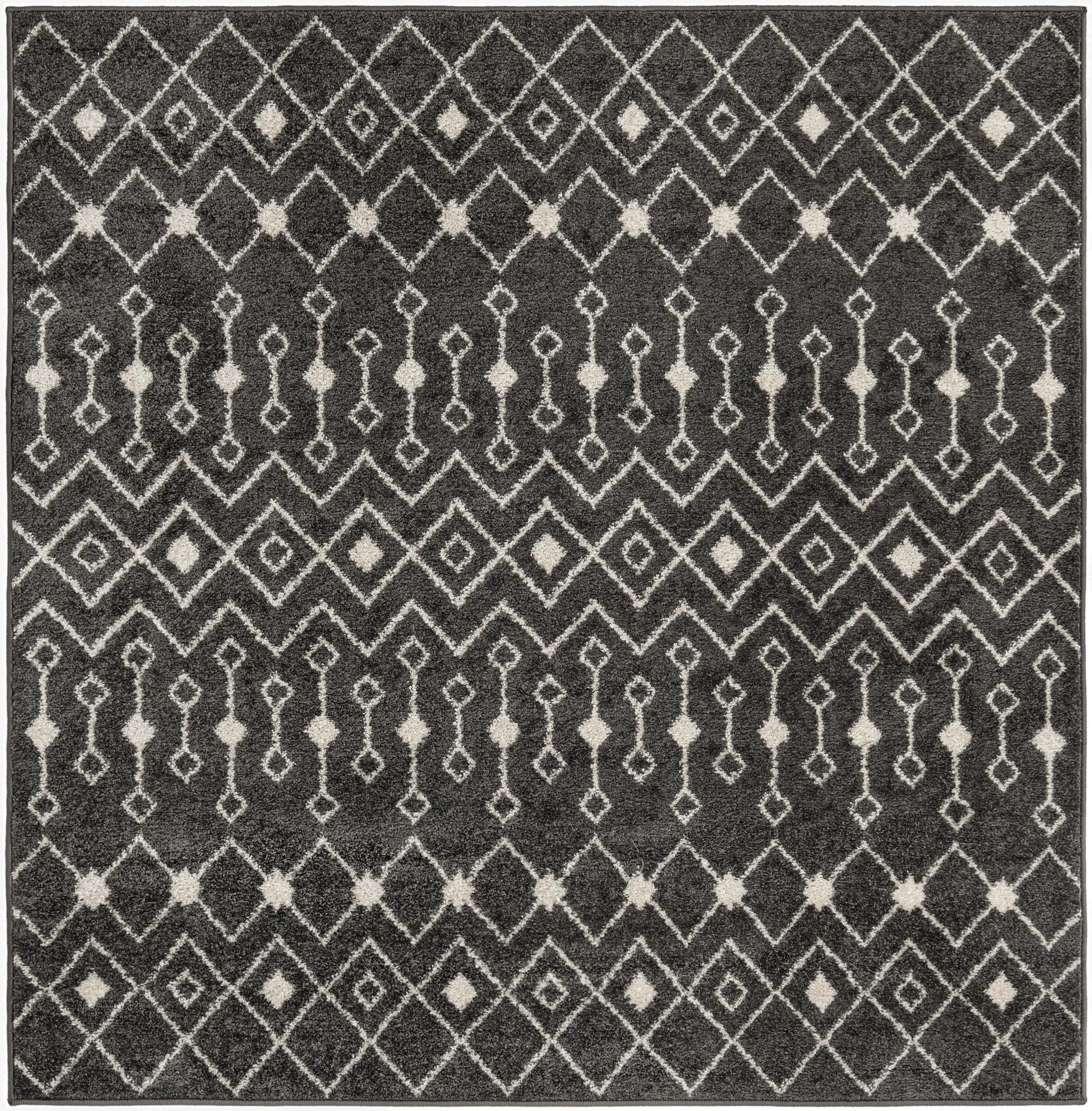 A 6'x6' square gray Moroccan Trellis rug with a bohemian tribal pattern of white diamonds and geometric shapes.