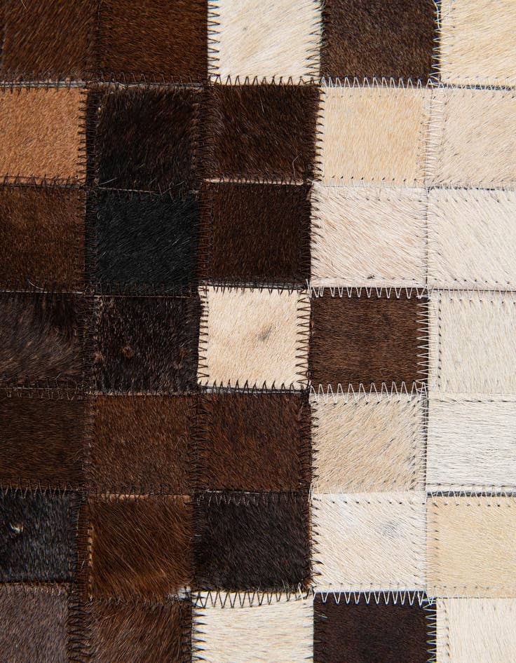 Detail image of  5' 1 x 8' Cowhide Stocks Rug