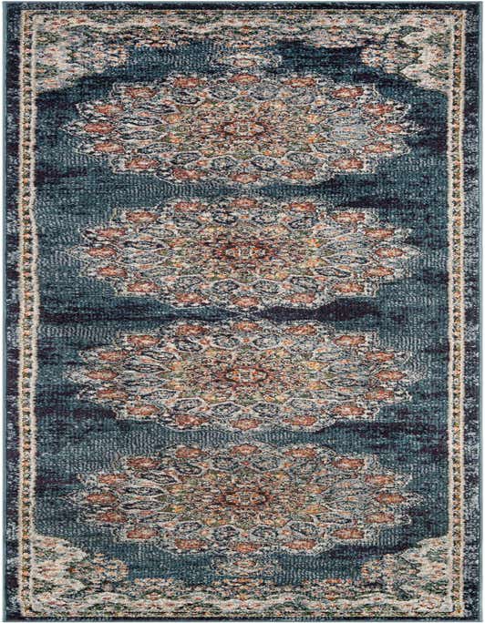 A 10 ft runner rug in denim blue with a traditional Oriental pattern featuring large, faded medallions in rust, cream, and green.