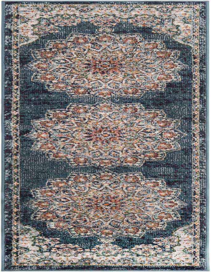 A 6 ft runner rug in denim blue with an ornate traditional medallion pattern in cream, rust, and teal.
