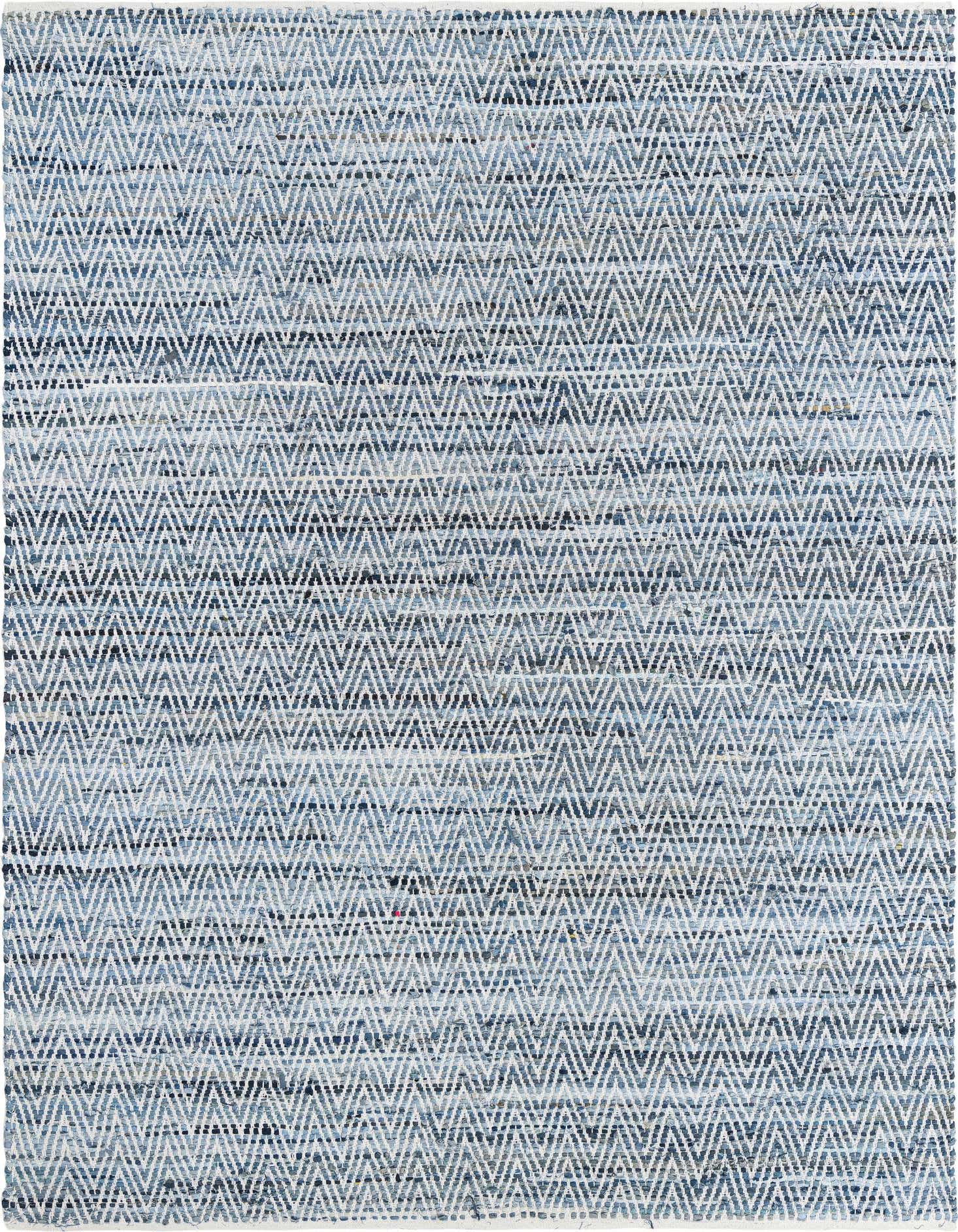 A rectangular 8x11 blue Chindi Chevron rug featuring a textured, flatweave pattern of light and dark blue denim cotton.