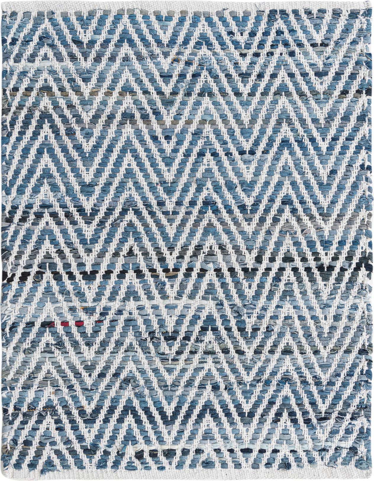A 2x3 rectangular Chindi Chevron rug featuring a bold blue and white zigzag pattern, made from recycled denim.
