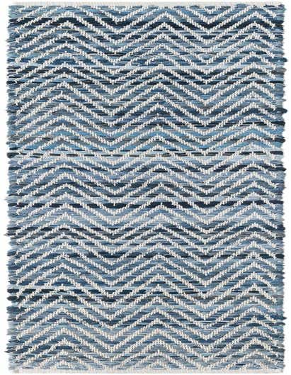 A 1' 2 x 6' 1 Chindi Chevron table runner rug in various shades of blue and white, featuring a textured zigzag pattern.