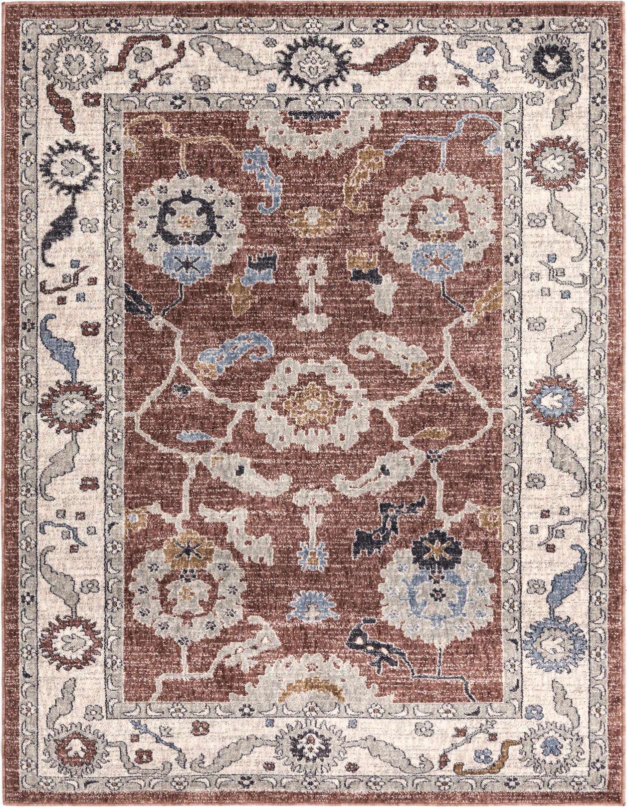 A 5x8 rectangular Eco Traditional rug featuring a pink and cream floral pattern with blue and gray accents, ideal for a living room.