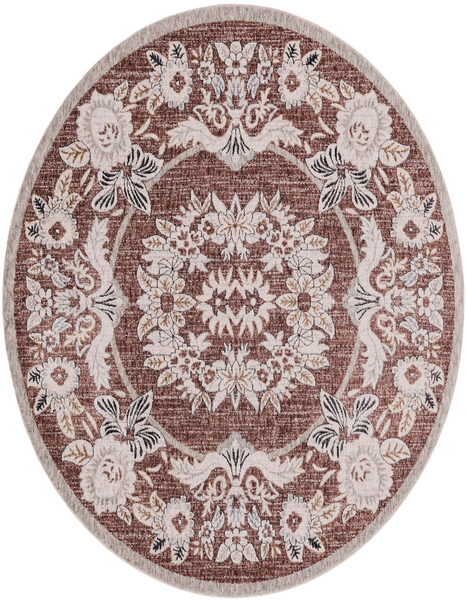 A 7' round pink traditional rug with an intricate floral medallion pattern and a light border.