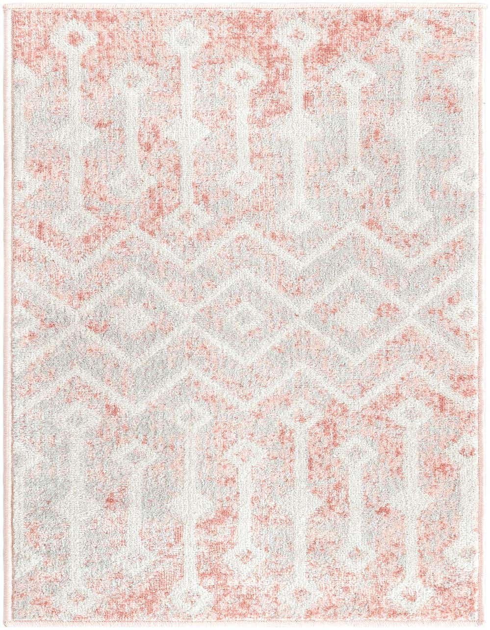 A 4 ft runner rug in pink and white with a distressed bohemian trellis pattern, perfect for a hallway.