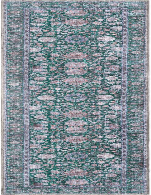 A long 8 ft runner rug in shades of green with an intricate floral pattern and a distressed look.
