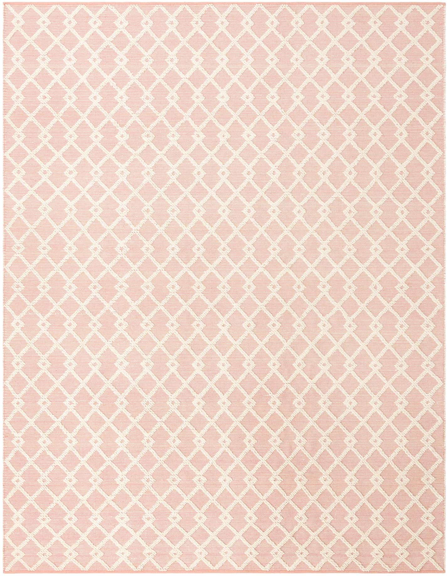 A 10x14 rectangular Jill Zarin Dorset rug in pink with a repeating cream geometric diamond pattern.