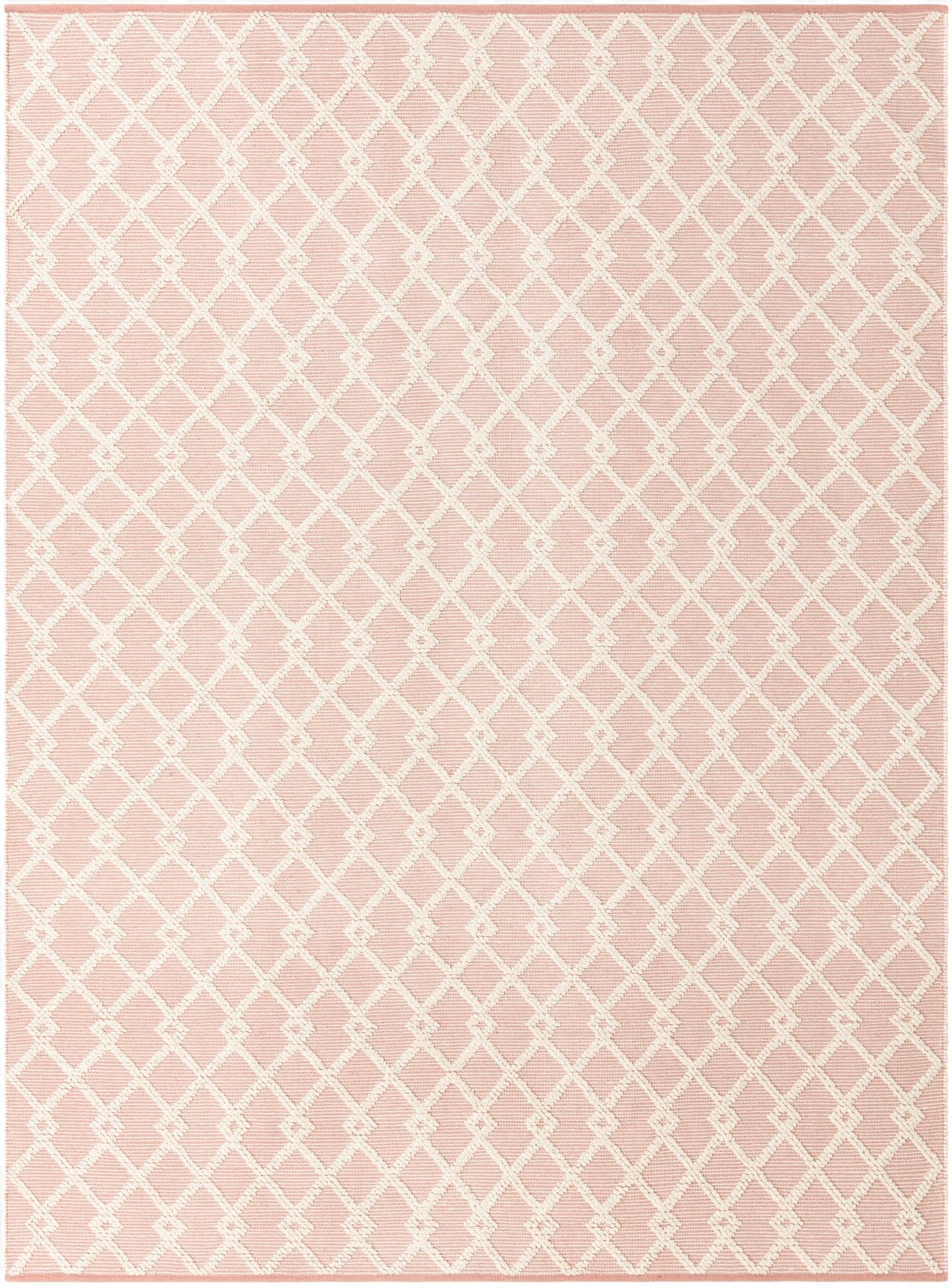 A 9x12 rectangular Jill Zarin Dorset rug in pink with a repeating white geometric diamond pattern, suitable for a modern living room.