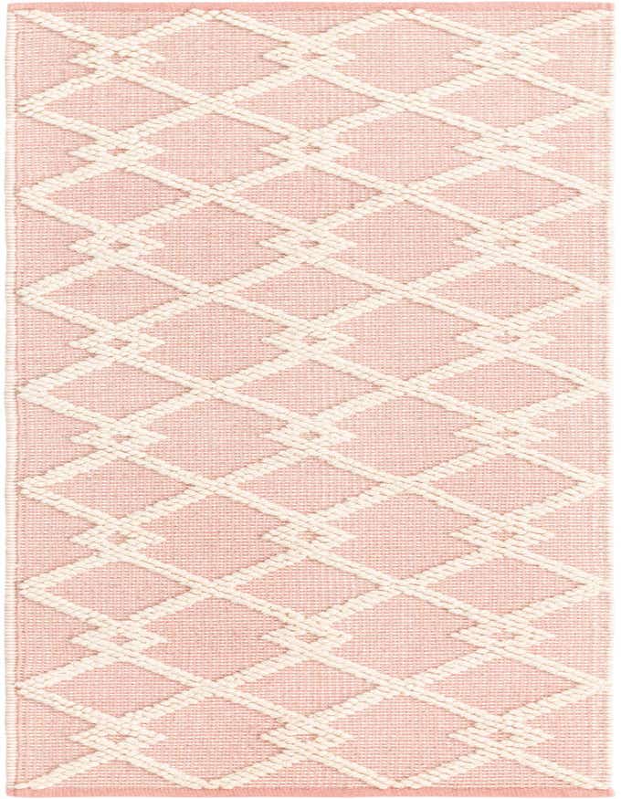A 6 ft runner rug with a modern abstract diamond pattern in pink and cream, ideal for hallways.