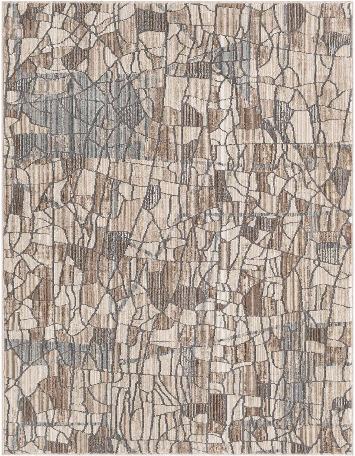 A 3x5 rectangular indoor rug featuring an abstract mosaic pattern in various shades of brown, tan, and white.