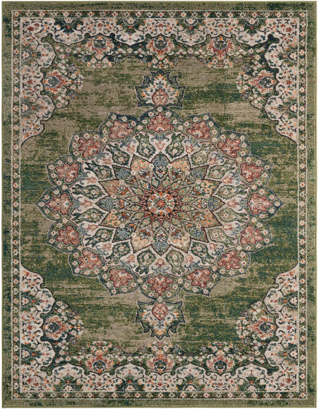 A 5x8 rectangular Isabella rug featuring a distressed green background with a central medallion and ornate floral patterns in cream, rust, and blue.