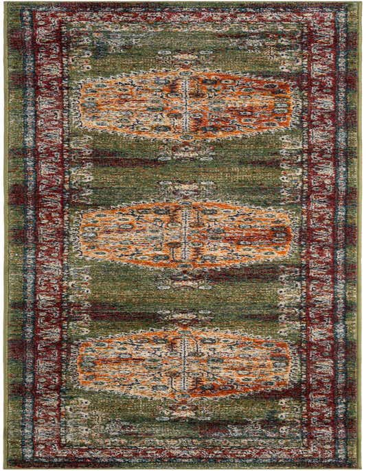 A 10 ft runner rug in traditional Oriental style, featuring a distressed green field with orange and red medallion patterns and a detailed border.