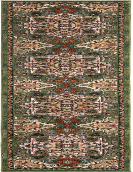 A 13 ft runner rug in shades of green with intricate traditional patterns in orange, beige, and blue.
