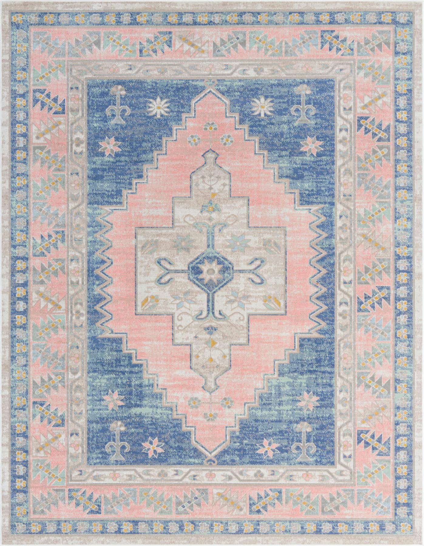 A 7x10 rectangular Whitney rug with a distressed tribal medallion pattern in shades of blue, pink, and cream.
