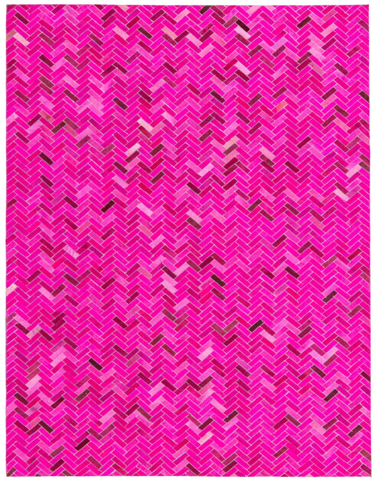 A vibrant 5x8 rectangular pink cowhide rug with a modern herringbone pattern, perfect for a living room.