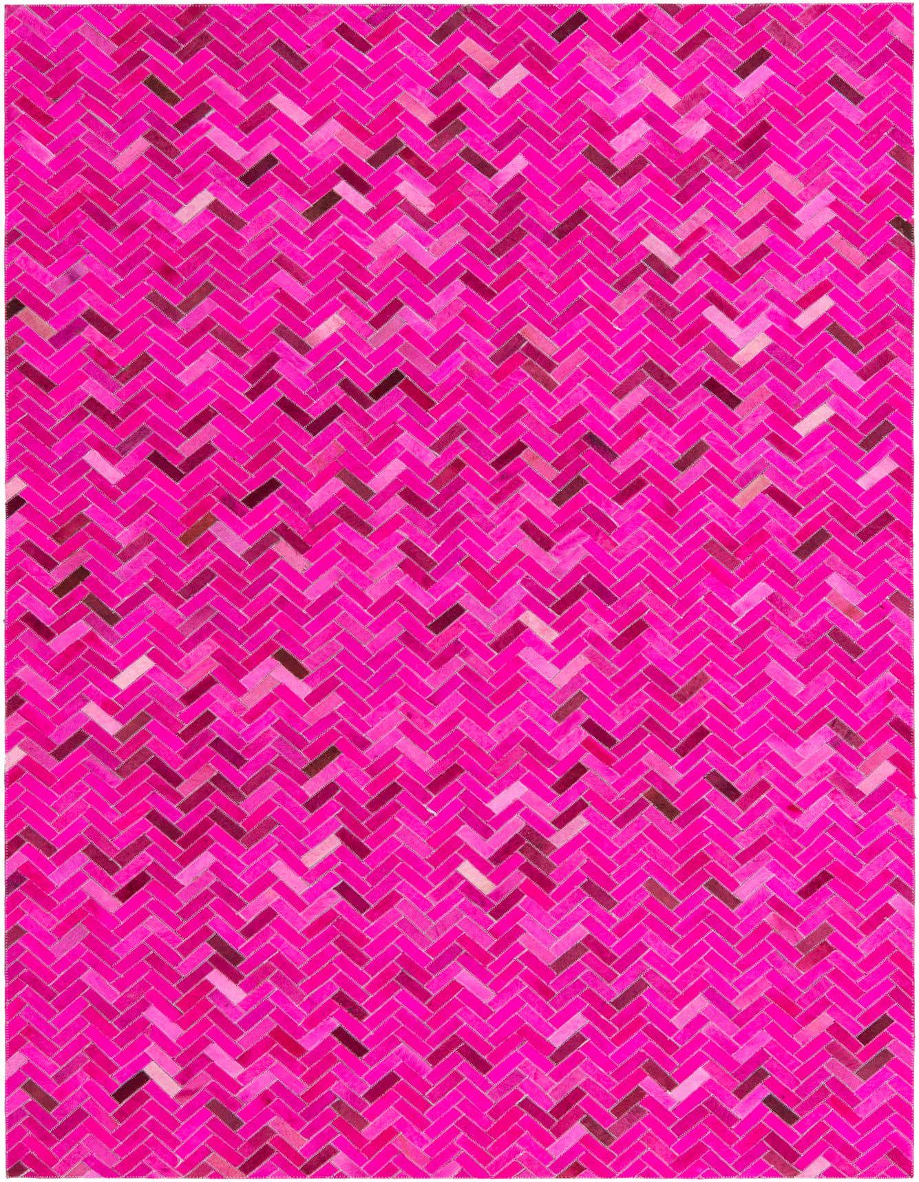 A vibrant 5x8 rectangular pink cowhide rug with a modern herringbone pattern, perfect for a living room.