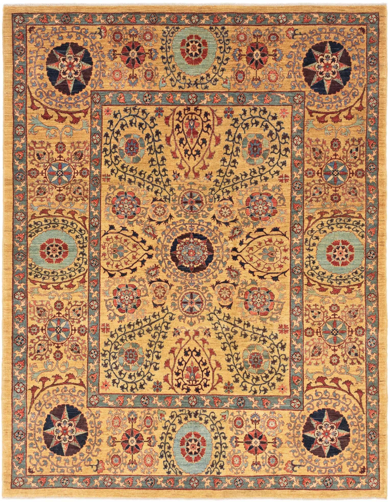 A 7x10 rectangular Ariana Ziegler rug in yellow with a traditional tribal pattern featuring intricate floral medallions and a detailed border.