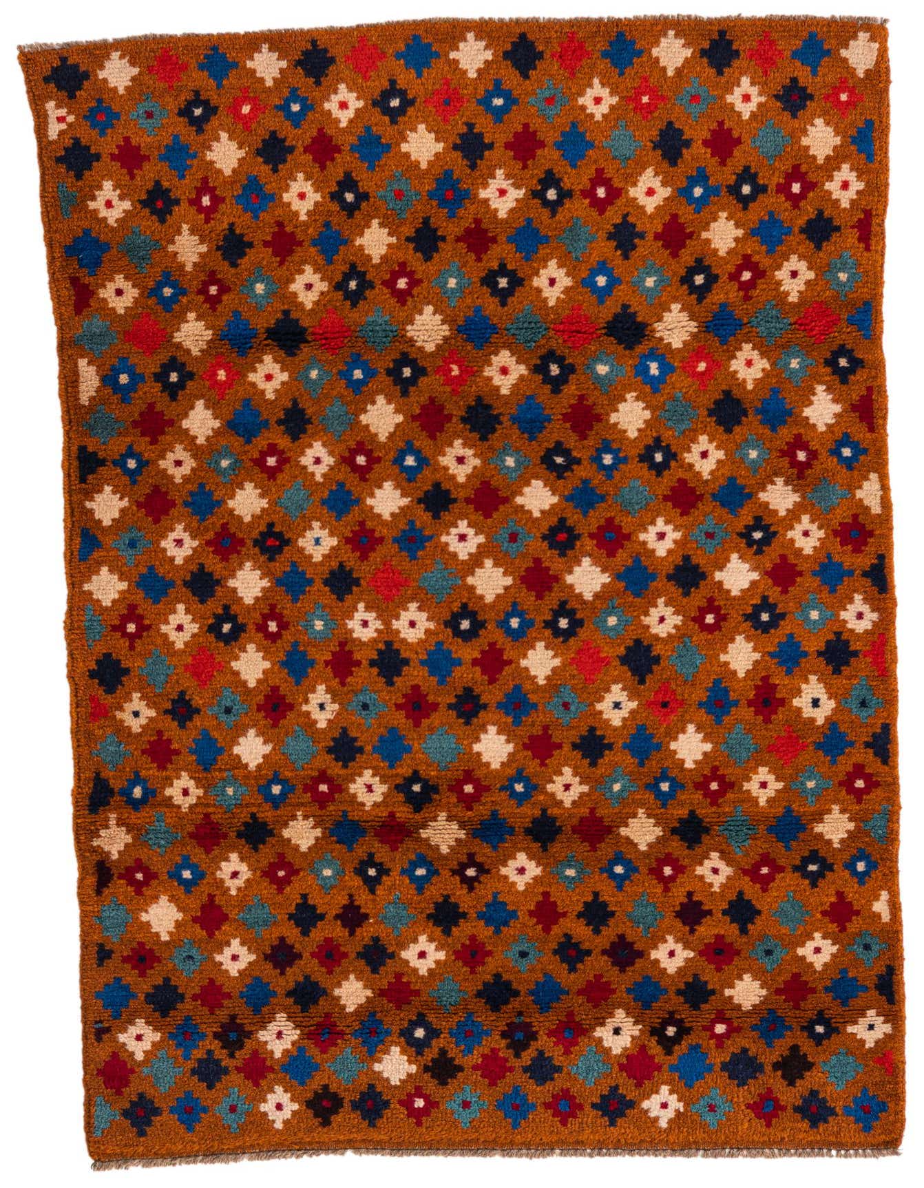 A 3x4 rectangular Balouch rug with a warm golden-yellow background and a repeating pattern of small tribal diamond motifs in red, blue, teal, and cream.