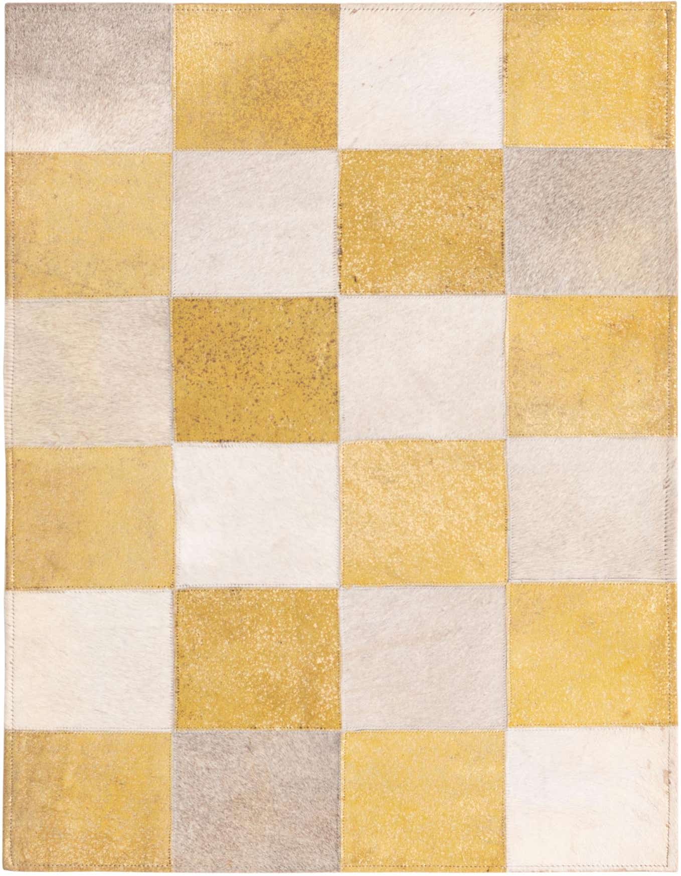 A 2x3 rectangular patchwork cowhide rug featuring a geometric pattern of yellow, gold, and light beige squares.