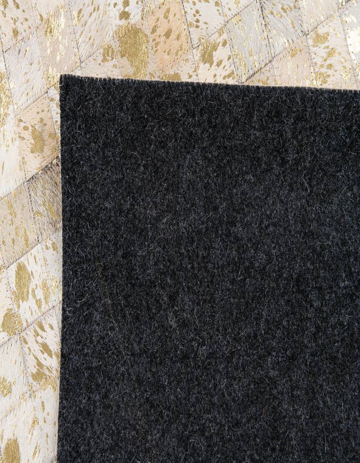 Detail image of  5' x 7' 11 Cowhide Stocks Rug