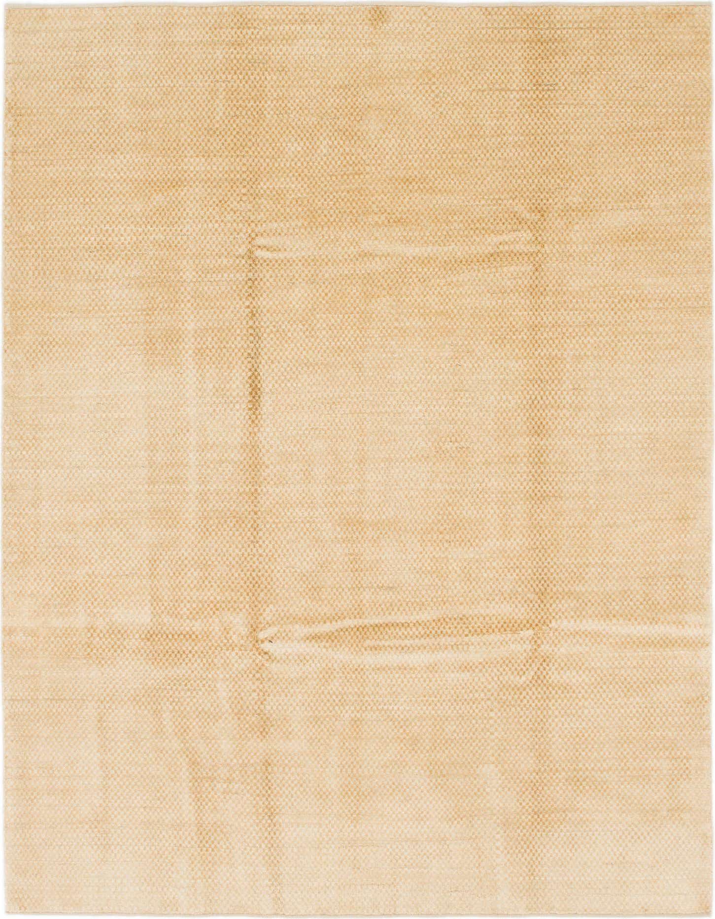 A 7x10 rectangular Kashkuli Gabbeh wool rug in a solid golden yellow color with a subtle textured weave.