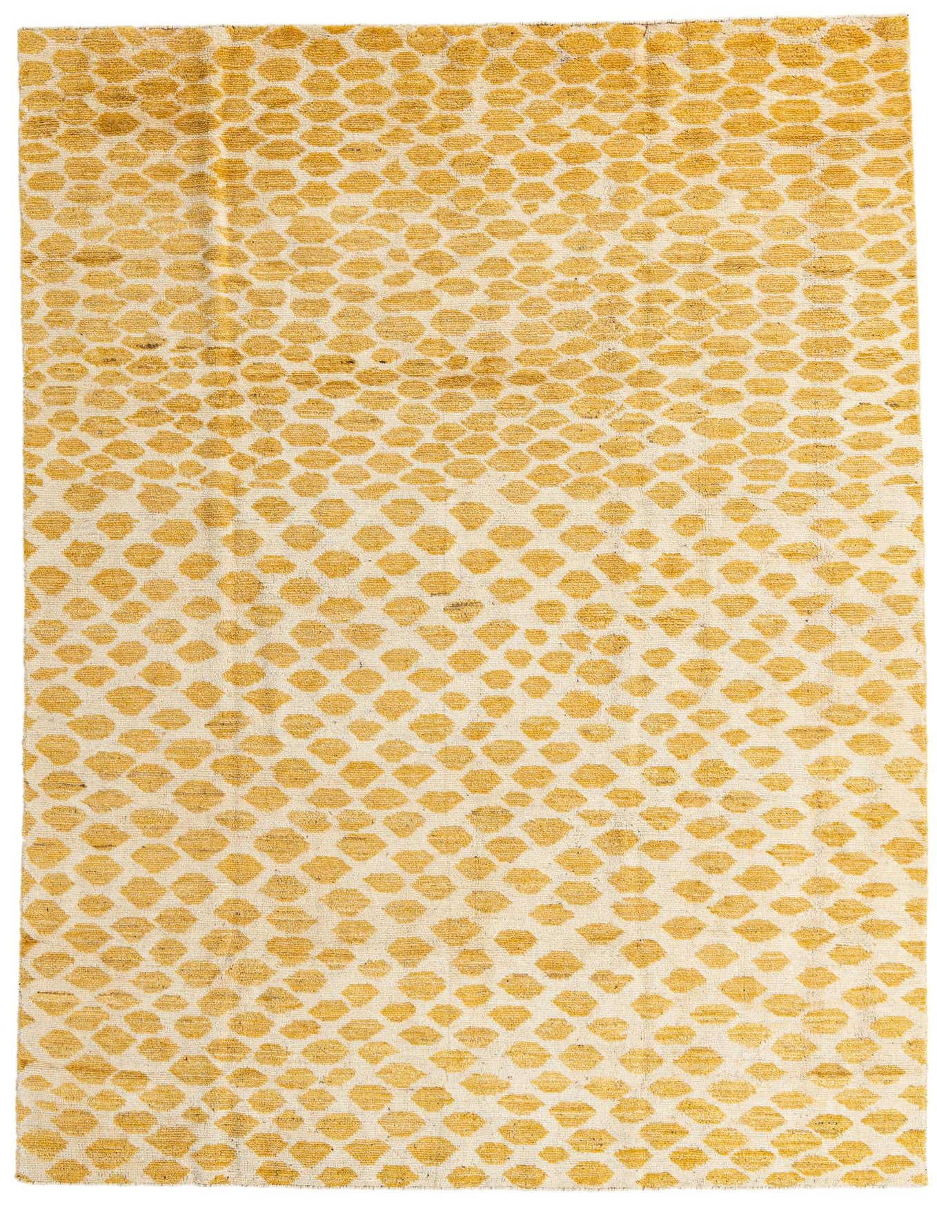 A 6x9 rectangular yellow and cream shag rug with a repeating abstract tribal pattern, suitable for a living room.