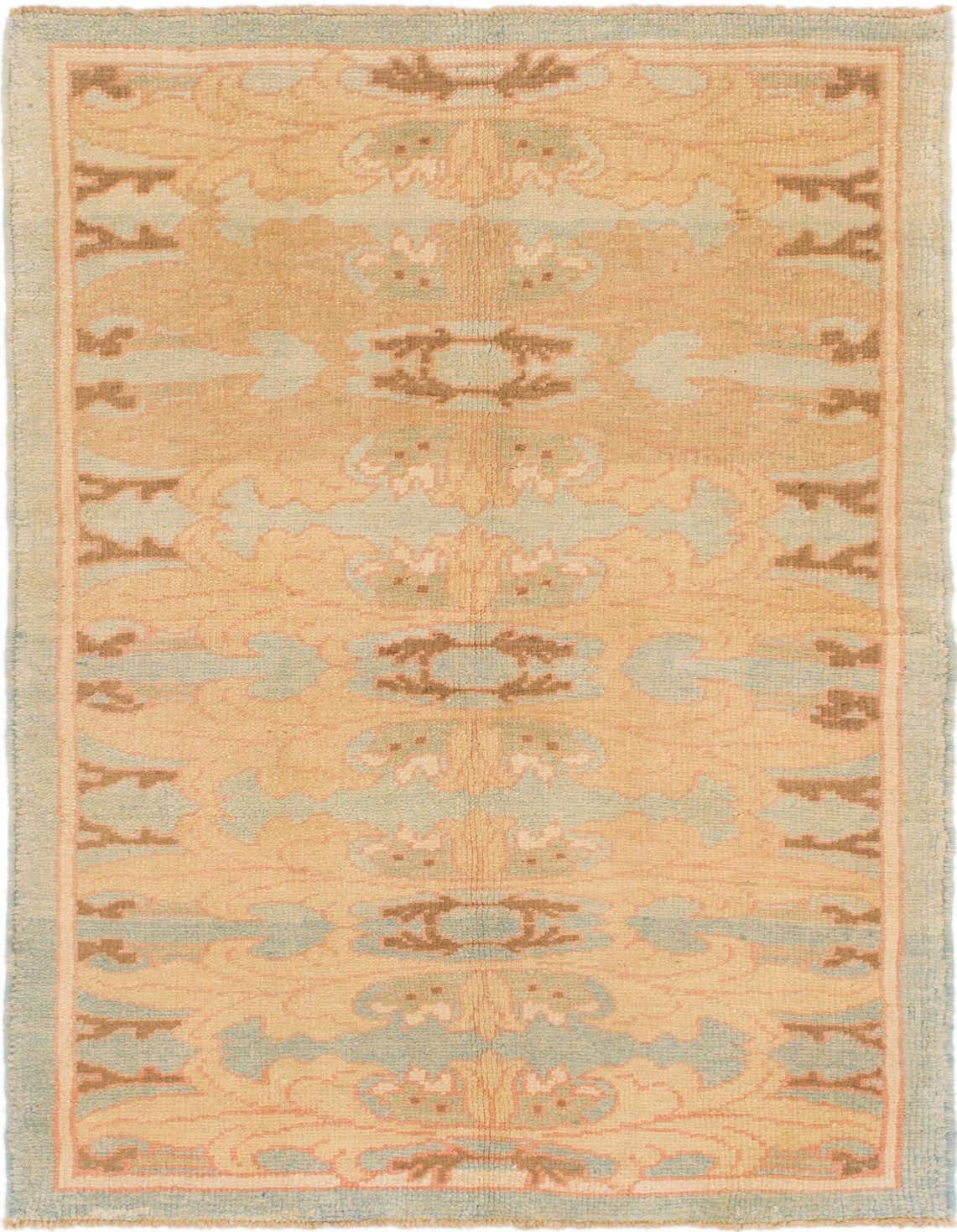 A 4x6 rectangular Oushak rug in yellow and gold with tribal and abstract patterns, featuring light blue and brown accents.