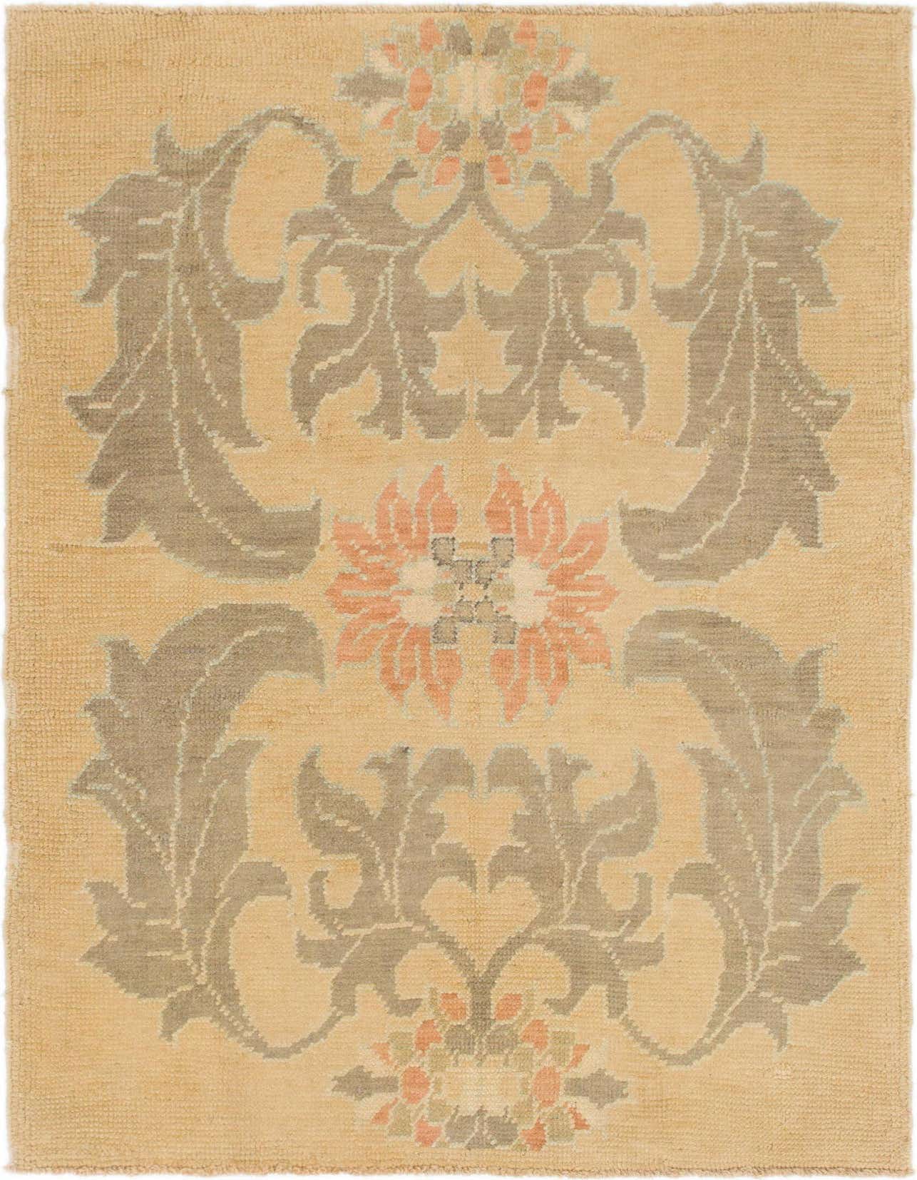 A 4x6 rectangular Oushak wool rug with a tribal medallion pattern in yellow, gold, gray, and peach tones.