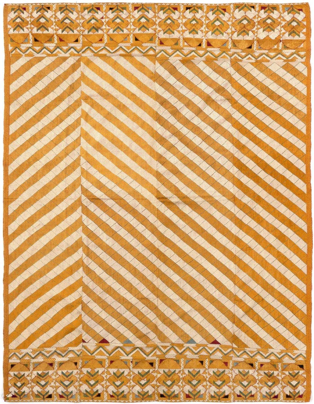 A 5x8 rectangular yellow and cream striped silk rug with intricate patterned borders at the top and bottom.