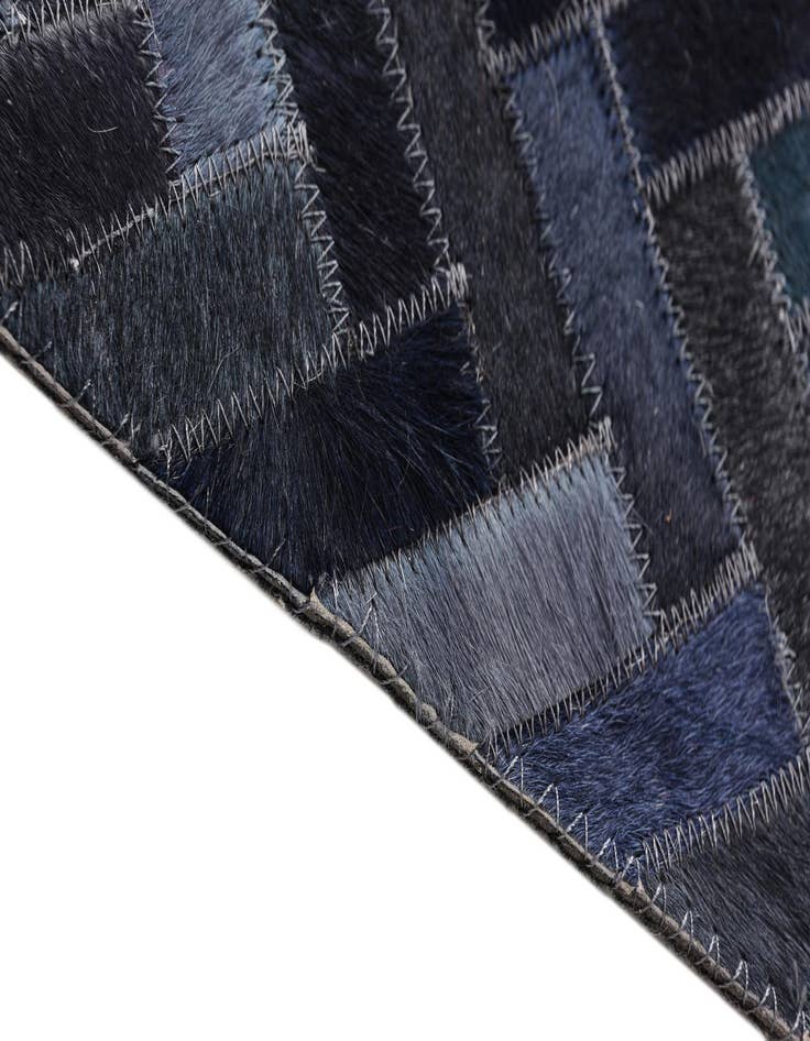 Detail image of  5' 1 x 7' 10 Cowhide Rug