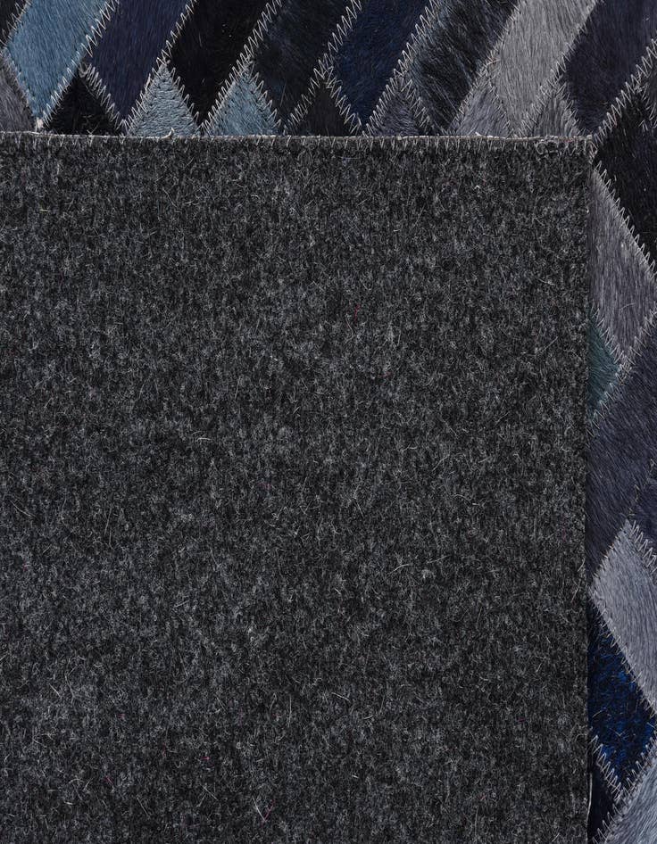 Detail image of  5' 1 x 7' 10 Cowhide Rug