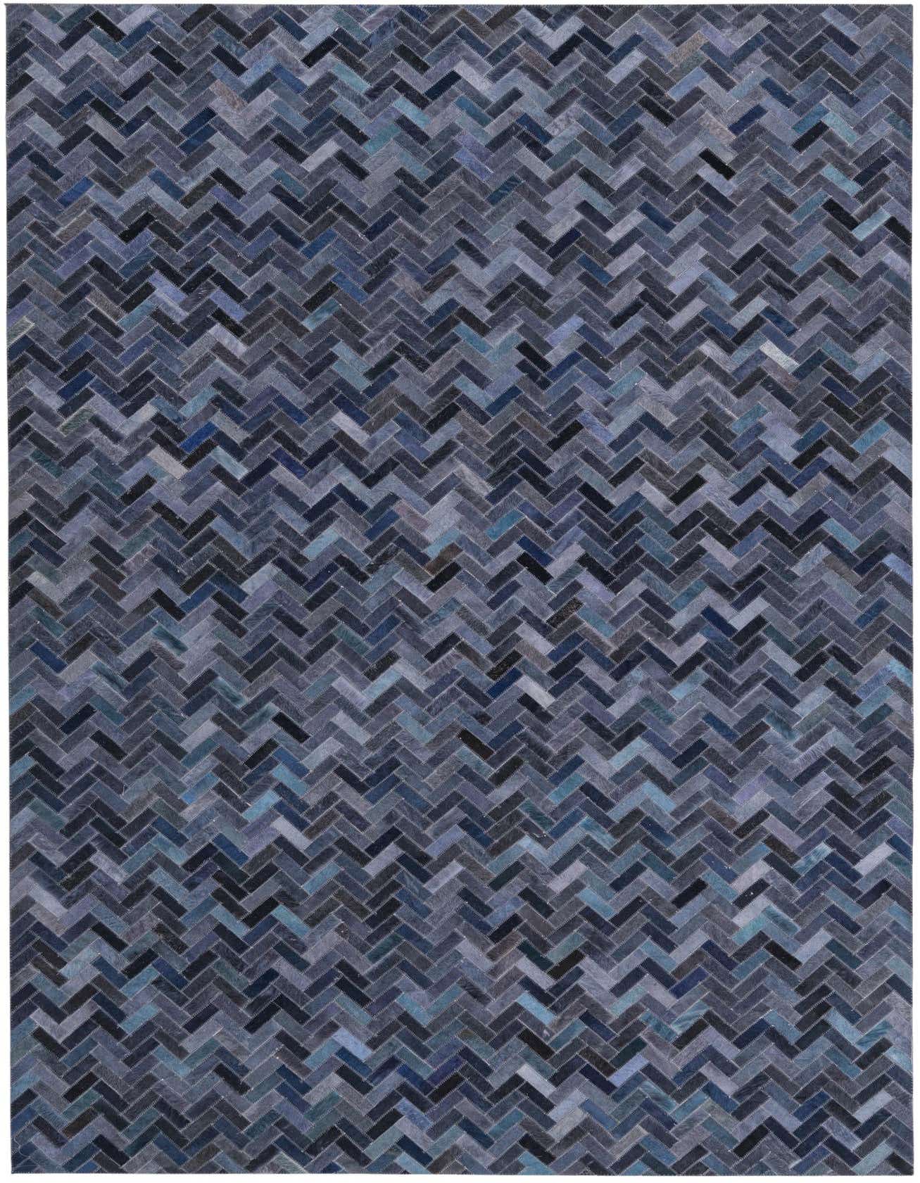 A 5x8 rectangular Cowhide rug featuring a modern herringbone pattern in varying shades of gray and silver.