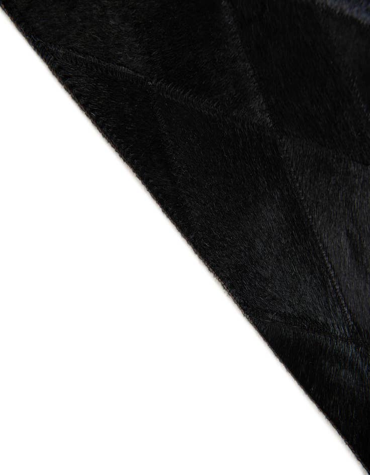 Detail image of  4' 7 x 6' 6 Cowhide Stocks Rug