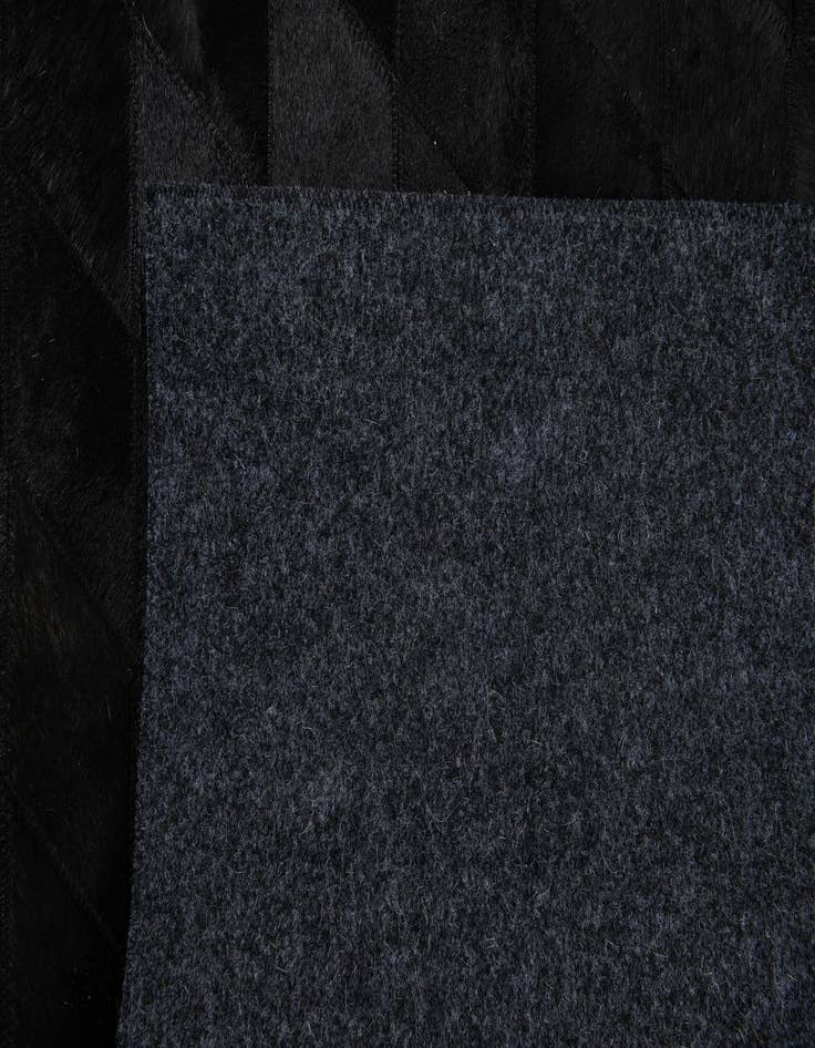 Detail image of  4' 7 x 6' 6 Cowhide Stocks Rug