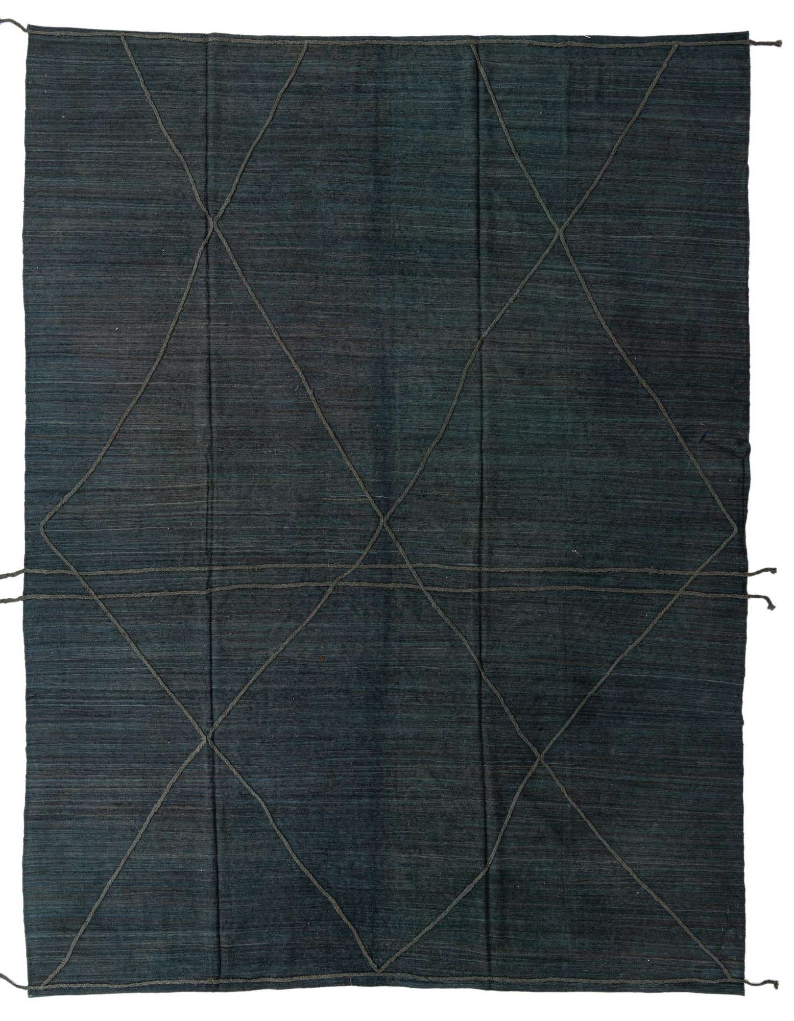 A 9x12 rectangular gray flatweave wool rug with a subtle tribal diamond pattern, ideal for a living room.