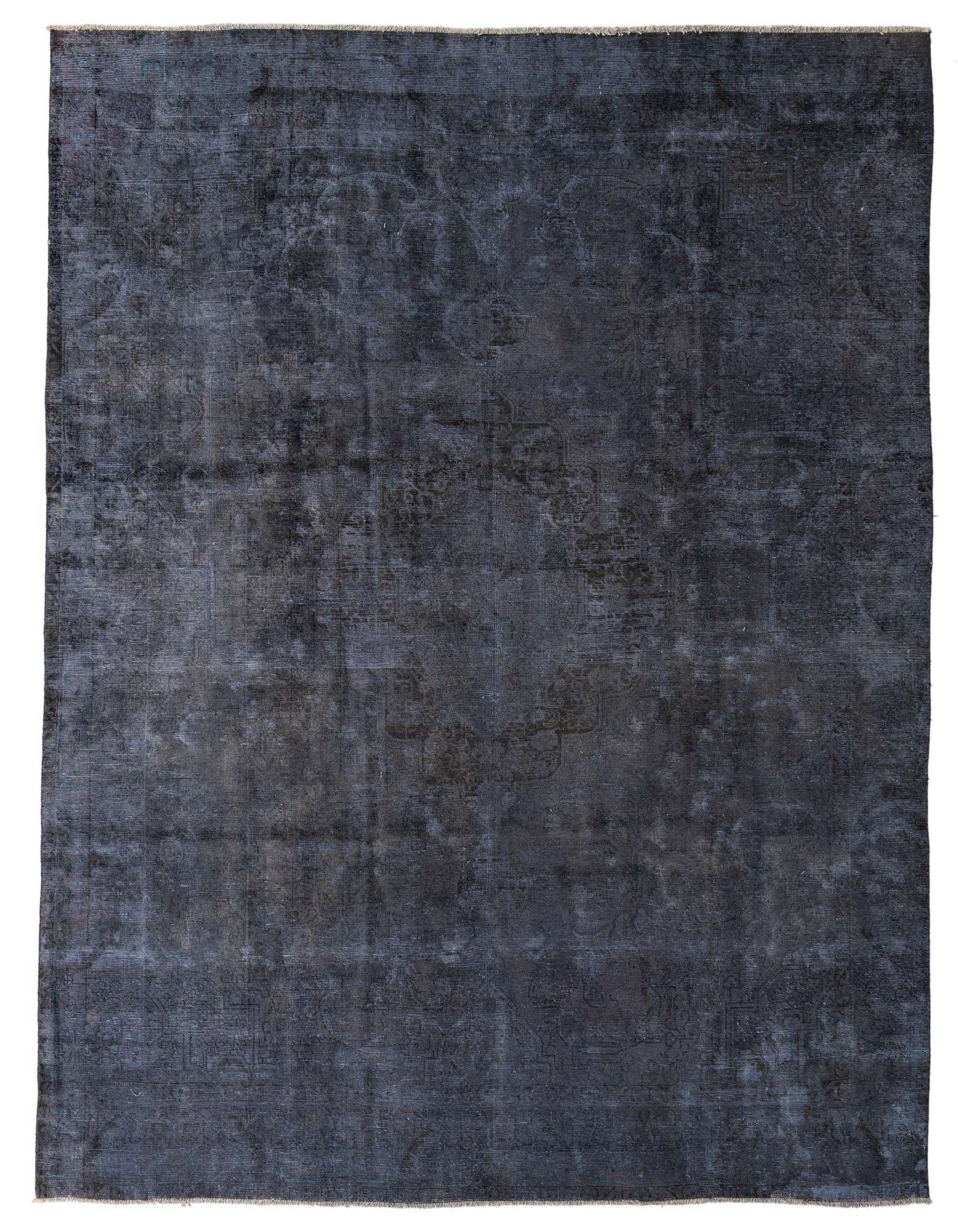 A large 9x12 rectangular gray wool area rug with a subtle, faded Persian medallion pattern, suitable for a living room.