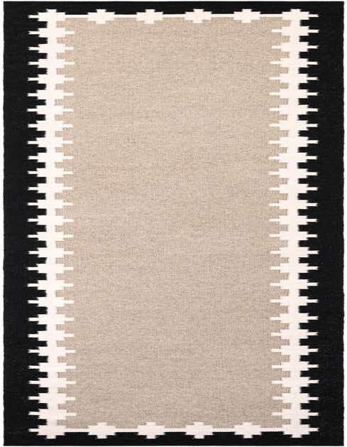 A 14 ft runner rug in gray with a black border and white tribal pattern, perfect for a hallway.