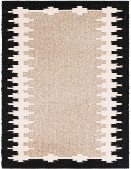 A gray and black 8 ft runner rug with a tribal pattern, featuring a light gray center bordered by a stepped black and off-white design.