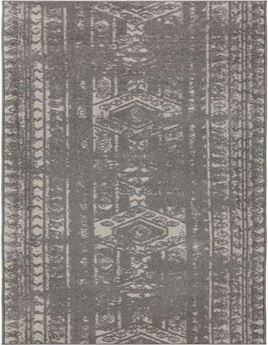A 12 ft runner rug in gray and ivory with a distressed Southwestern tribal pattern, ideal for a hallway.