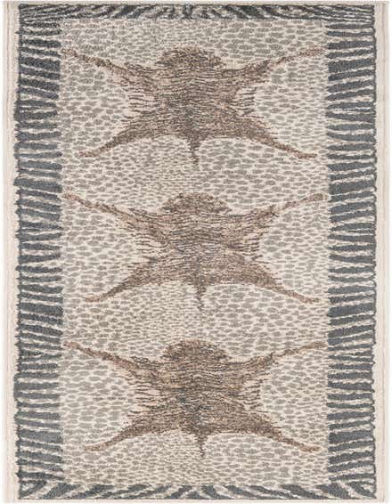 A 12 ft runner rug with a modern animal print pattern in ivories, creams, and grays, featuring three stylized animal hide shapes down its length, bordered by a zebra stripe pattern.