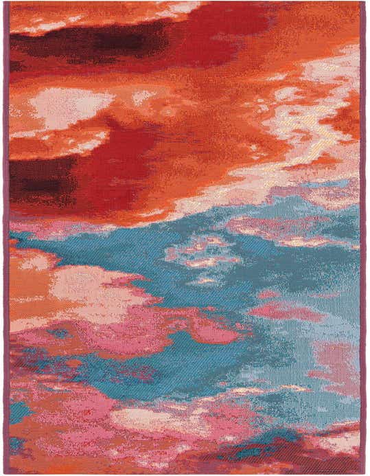 A modern abstract runner rug in a vibrant mix of pinks, oranges, and blues, resembling a colorful cloudy sky.