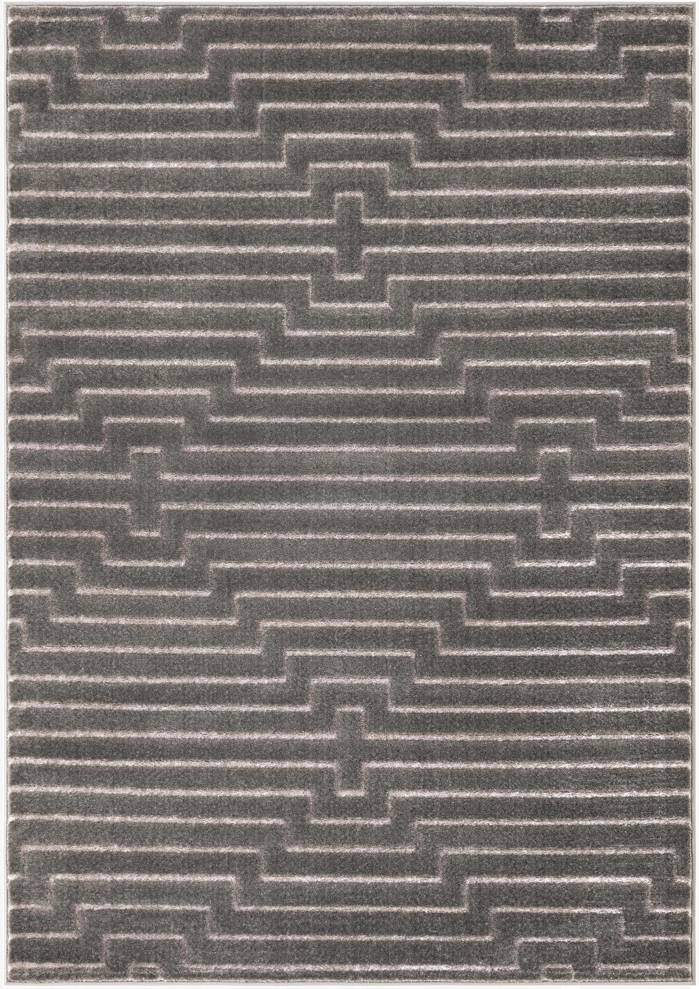 A 5x7 rectangular gray and silver indoor rug with a textured geometric pattern, ideal for a living room.