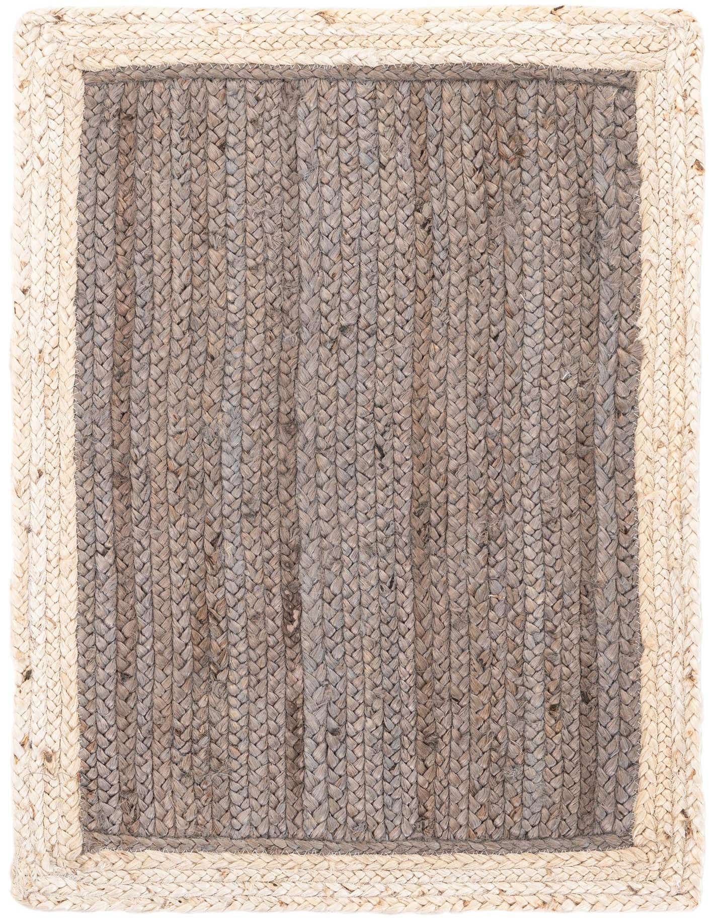 A 2x3 rectangular Braided Jute rug with a gray center and a light natural border, showcasing its textured, flatweave design.