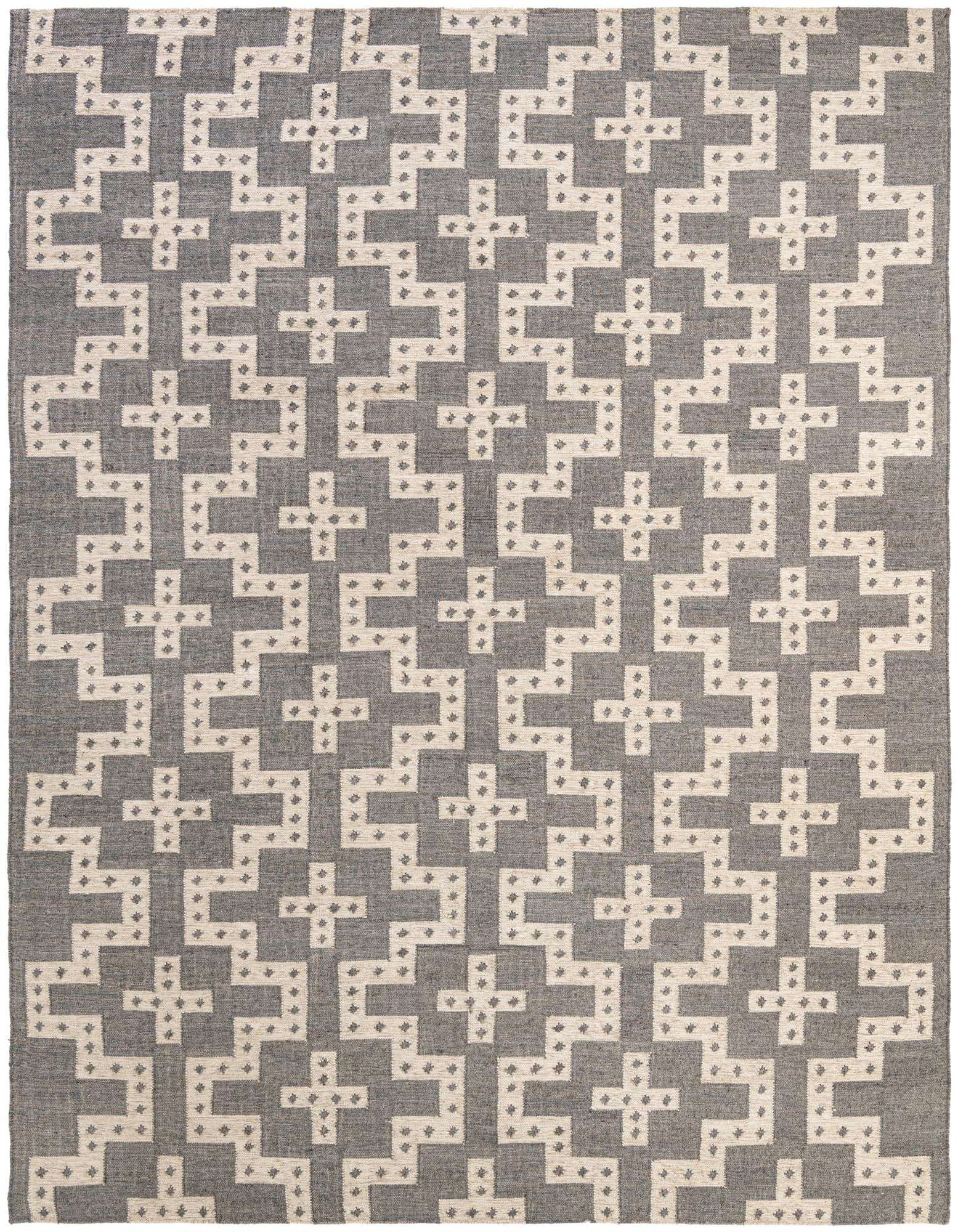 A 9x12 rectangular gray and white wool rug with a repeating tribal geometric pattern, suitable for a living room.