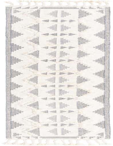 A 13 ft runner rug featuring a modern tribal pattern in gray and white shag, with decorative tassels.