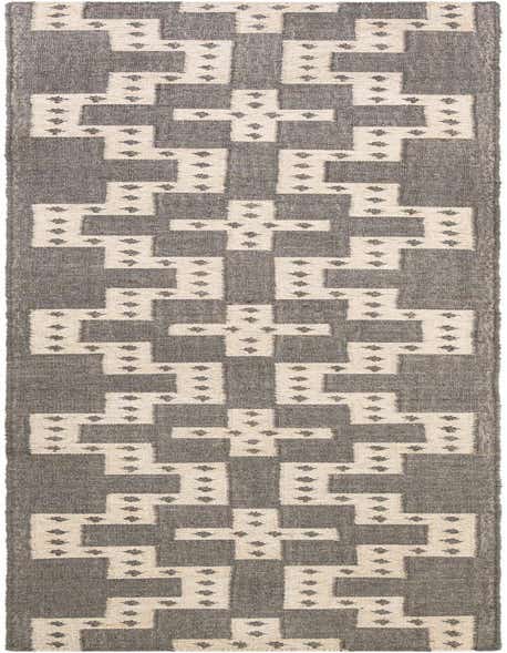 A 12 ft runner rug with a tribal geometric pattern in gray and white, suitable for a hallway.